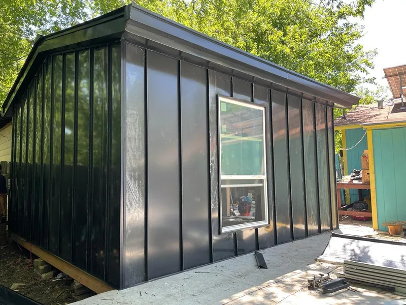 Black standing seam metal wall panels for Roof Inspection in Atchison