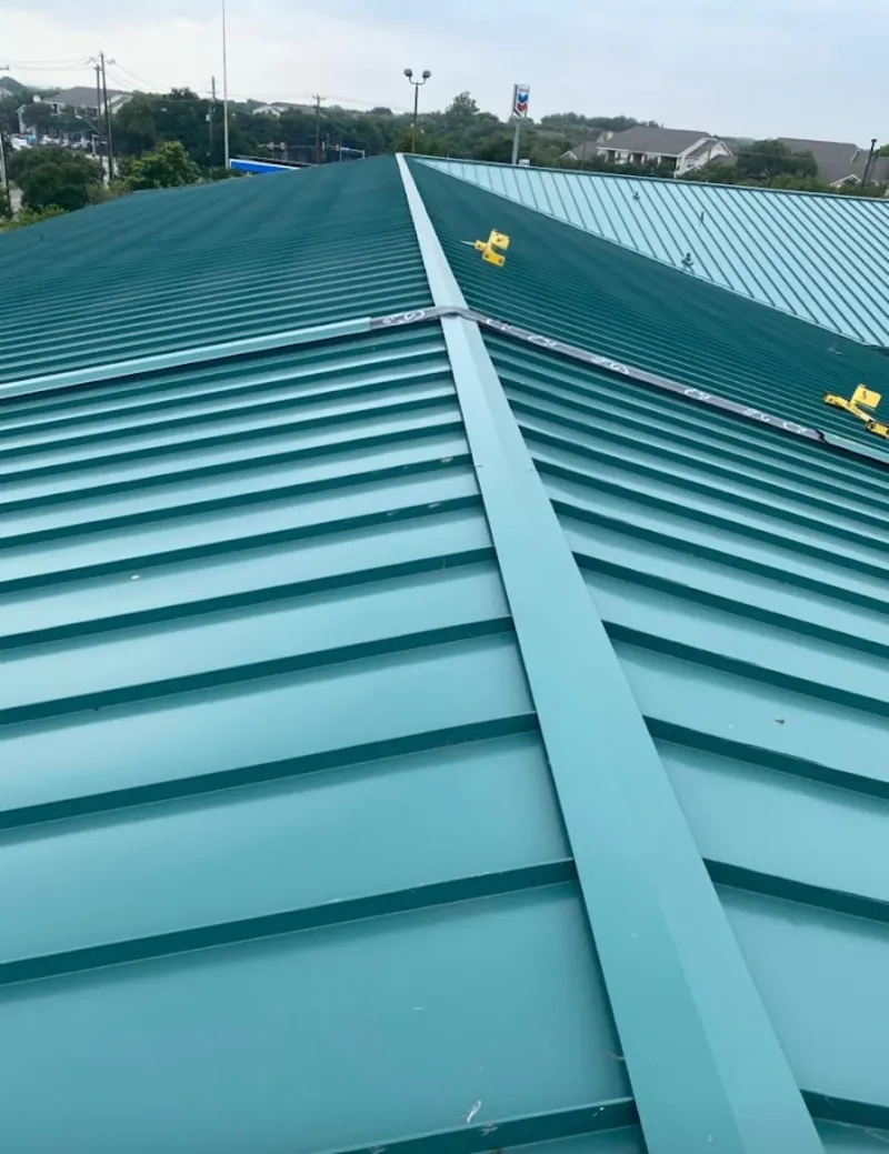 Green commercial metal roof ridge and valley for Metal Roof Repair in Atchison