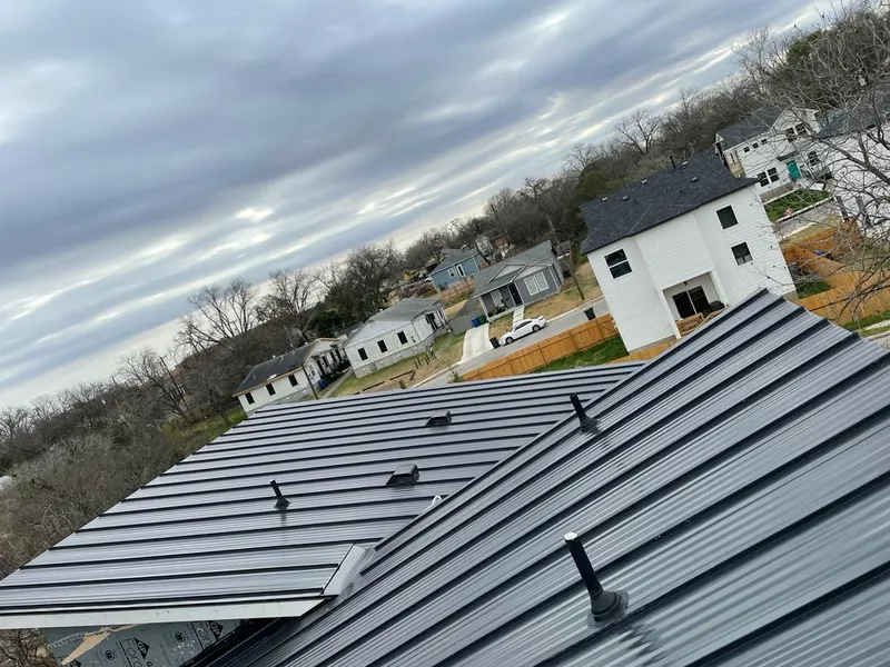 Standing seam metal roof panels with vents for Skylight Repair in Atchison